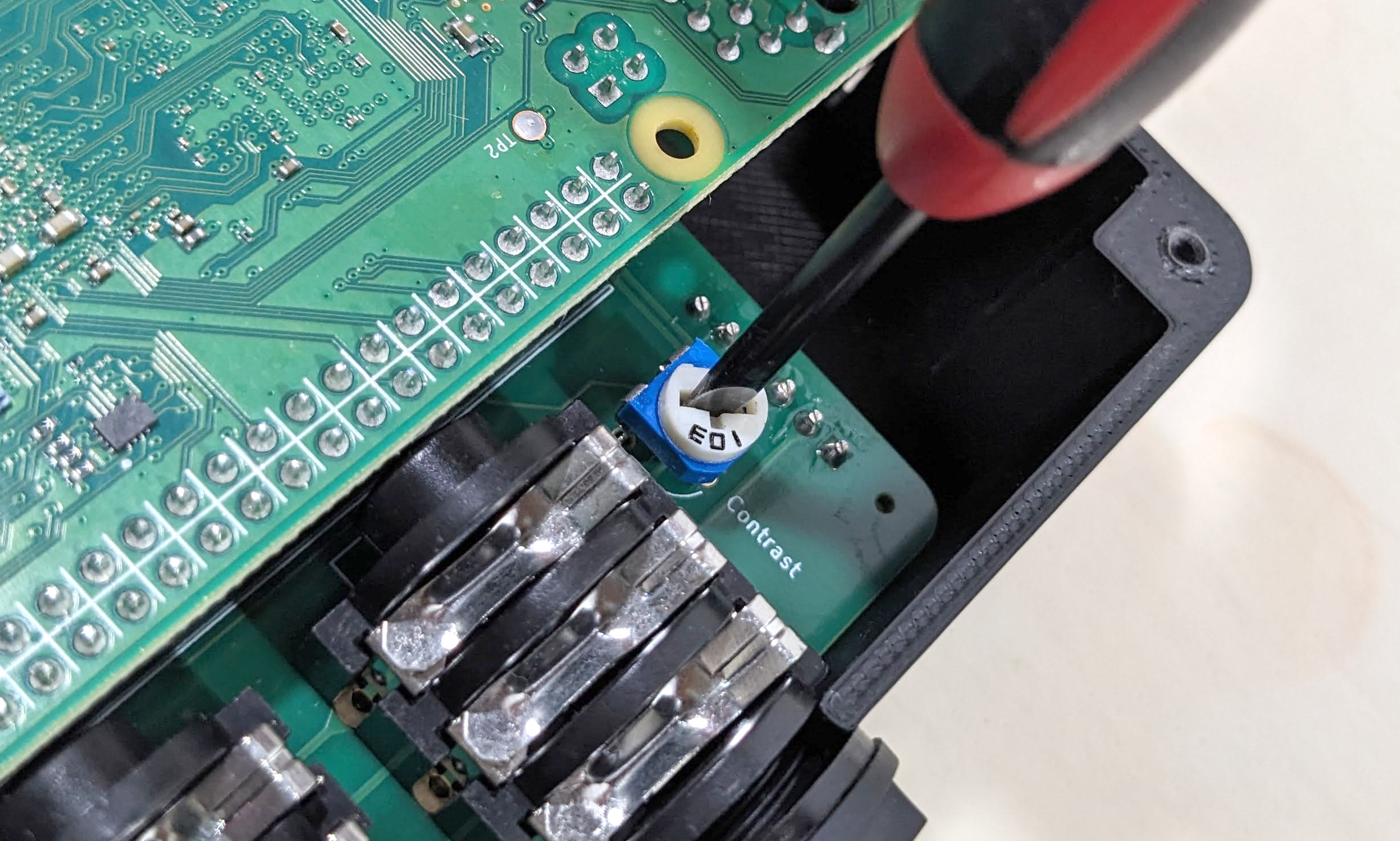 screwdriver adjusting hardware contrast potentiometer